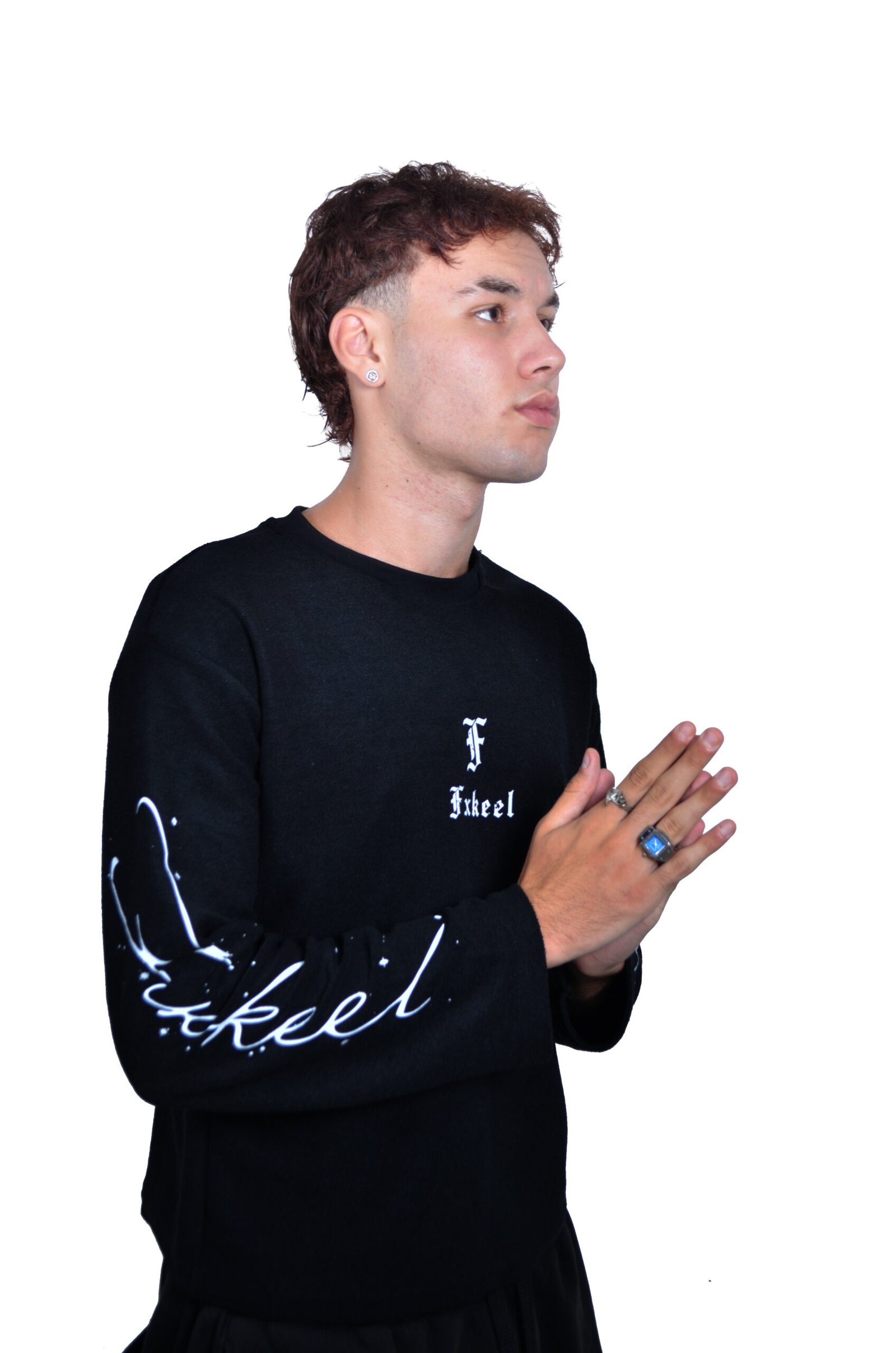 Close-up portrait of a model in Fxkeel clothing